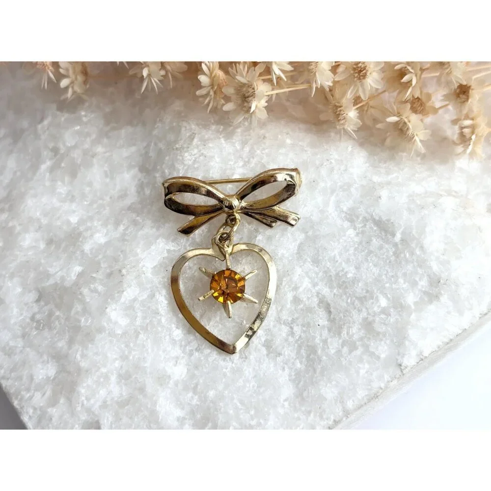 Gold Toned Matte Ribboned Bow Heart Shaped Orange Rhinestoned  Brooch